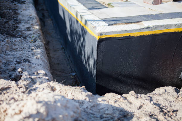 Professional Exterior Waterproofing technician working in Bitely, MI